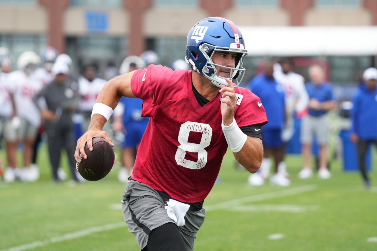 Jul 25, 2024; East Rutherford, NY, USA; New York Giants quarterback Daniel Jones (8) scrambles during training camp at Quest Diagnostics Training Center. Mandatory Credit: Lucas Boland-USA TODAY Sports