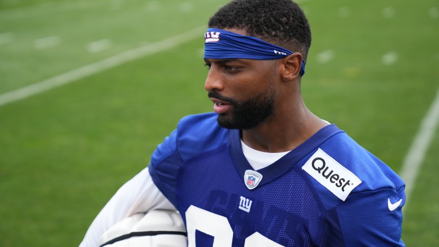 Jul 25, 2024; East Rutherford, NY, USA; New York Giants wide receiver Darius Slayton (86) gives an interview after training camp at Quest Diagnostics Training Center. Mandatory Credit: Lucas Boland-USA TODAY Sports