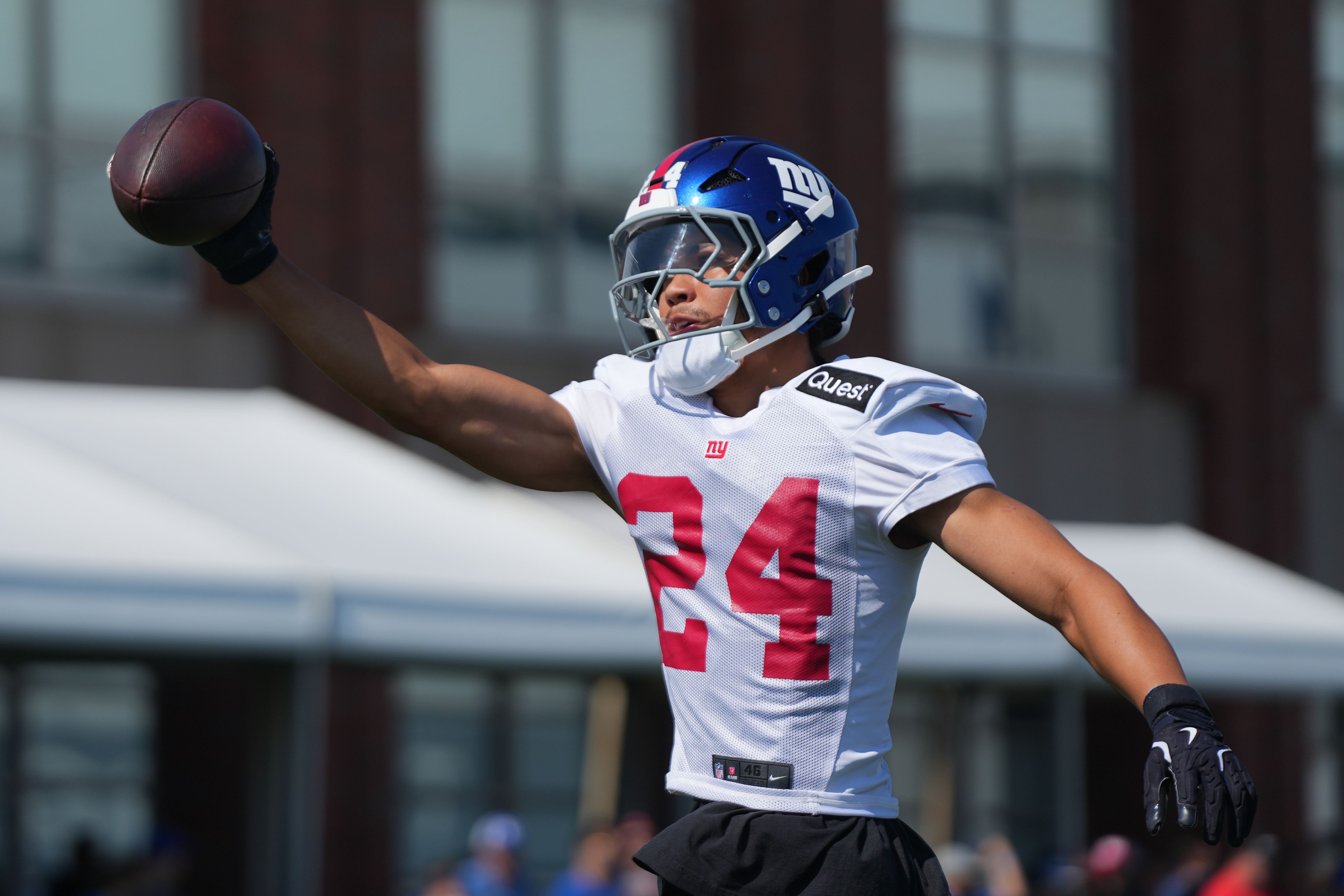 Jul 26, 2024; East Rutherford, NJ, USA; New York Giants safety Dane Belton (24) catches a pass with one hand during training camp at Quest Diagnostics Training Center. Mandatory Credit: Lucas Boland-USA TODAY Sports