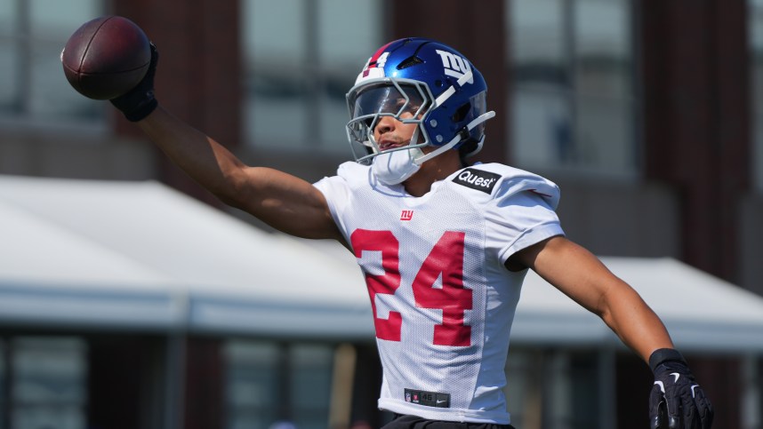 Jul 26, 2024; East Rutherford, NJ, USA; New York Giants safety Dane Belton (24) catches a pass with one hand during training camp at Quest Diagnostics Training Center. Mandatory Credit: Lucas Boland-USA TODAY Sports