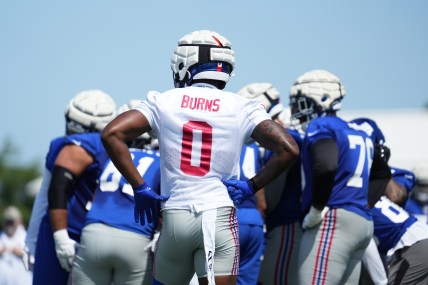 Jul 26, 2024; East Rutherford, NJ, USA; New York Giants linebacker Brian Burns (0) looks on during training camp at Quest Diagnostics Training Center. Mandatory Credit: Lucas Boland-USA TODAY Sports