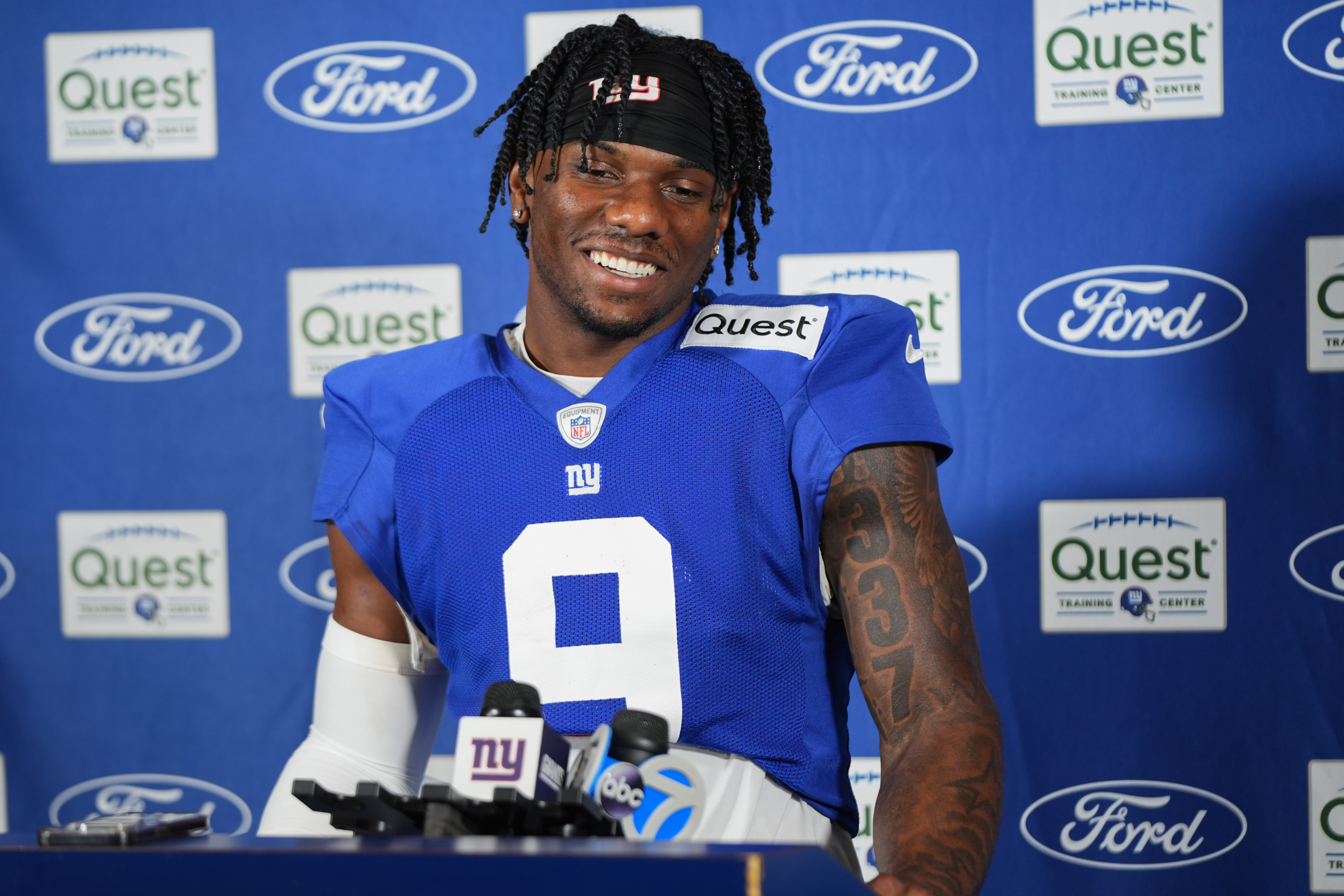 Jul 26, 2024; East Rutherford, NJ, USA; New York Giants wide receiver Malik Nabers (9) speaks at a press conference after training camp at Quest Diagnostics Training Center. Mandatory Credit: Lucas Boland-USA TODAY Sports