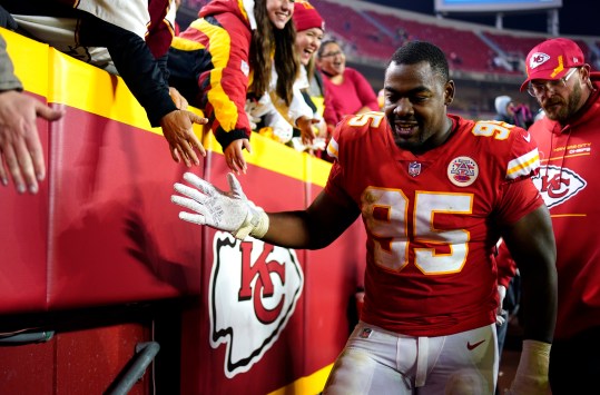 Nov 1, 2021; Kansas City, Missouri, USA; Kansas City Chiefs defensive end Chris Jones (95) celebrates with fans in the stands after defeating the New York Giants at GEHA Field at Arrowhead Stadium. Mandatory Credit: Jay Biggerstaff-USA TODAY Sports