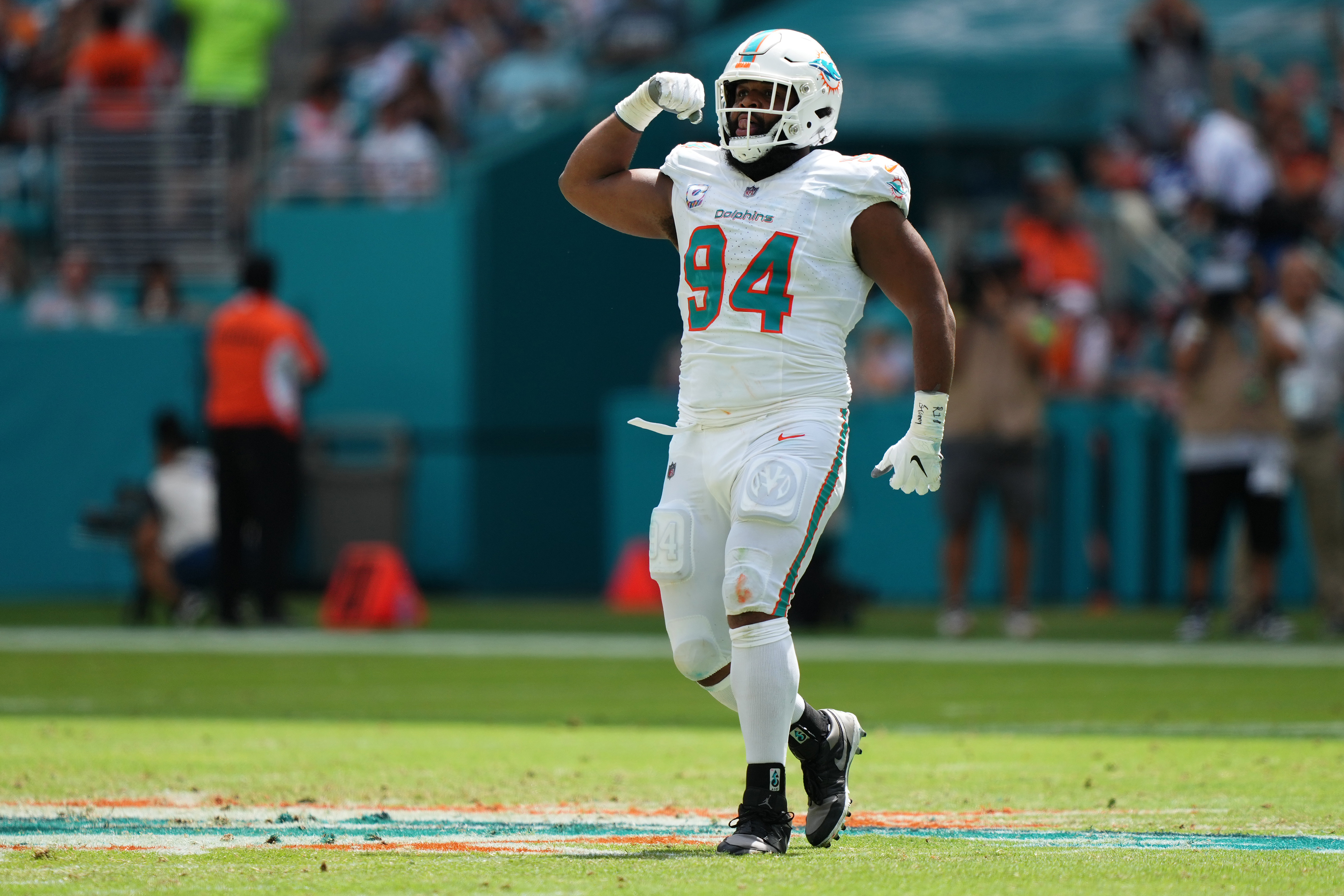 Oct 8, 2023; Miami Gardens, Florida, USA; Miami Dolphins defensive tackle Christian Wilkins (94) celebrates after sacking New York Giants quarterback Daniel Jones (not pictured) during the first half at Hard Rock Stadium. Mandatory Credit: Jasen Vinlove-USA TODAY Sports