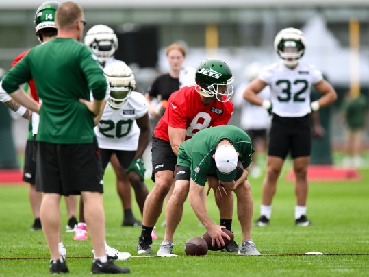 Jul 25, 2024; Florham Park, NJ, USA; New York Jets quarterback Aaron Rodgers (8) participates in a drill during training camp at Atlantic Health Jets Training Center. Mandatory Credit: John Jones-USA TODAY Sports