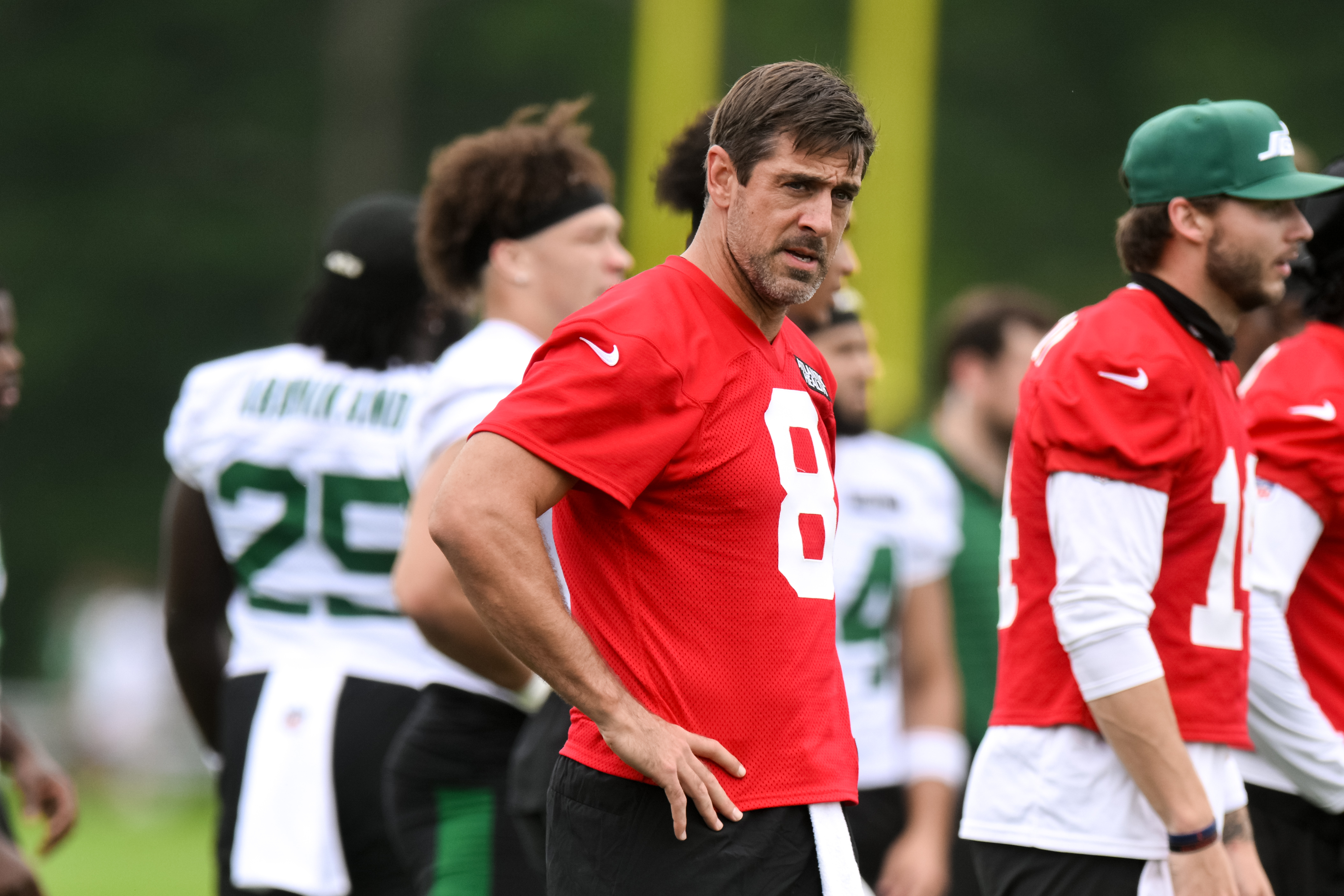 Jul 25, 2024; Florham Park, NJ, USA; New York Jets quarterback Aaron Rodgers (8) looks on during training camp at Atlantic Health Jets Training Center. Mandatory Credit: John Jones-USA TODAY Sports