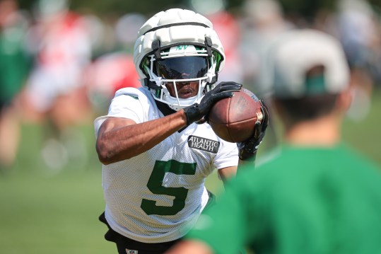 Jul 27, 2024; Florham Park, NJ, USA; New York Jets wide receiver Garrett Wilson (5) catches the ball during a drill during training camp at Atlantic Health Jets Training Center. Mandatory Credit: Vincent Carchietta-USA TODAY Sports