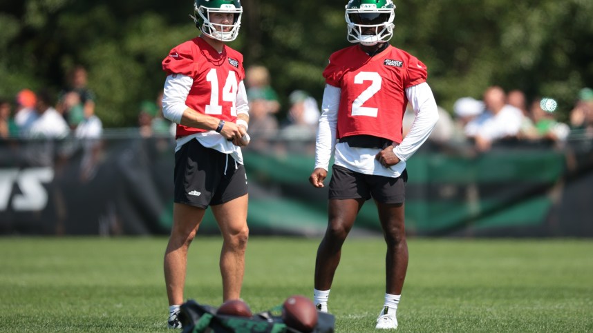 Jul 27, 2024; Florham Park, NJ, USA; New York Jets quarterback Andrew Peasley (14) and quarterback Tyrod Taylor (2) look on during training camp at Atlantic Health Jets Training Center. Mandatory Credit: Vincent Carchietta-USA TODAY Sports