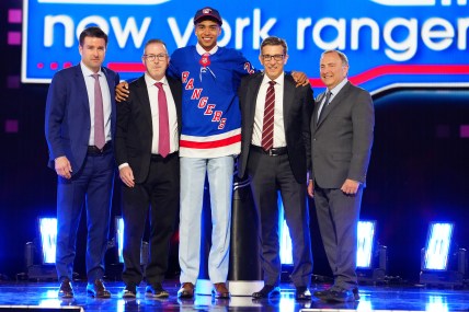 Jun 28, 2024; Las Vegas, Nevada, USA; Eric (EJ) Emery is selected by the New York Rangers with the 30th overall pick in the first round of the 2024 NHL Draft at The Sphere. Mandatory Credit: Stephen R. Sylvanie-USA TODAY Sports