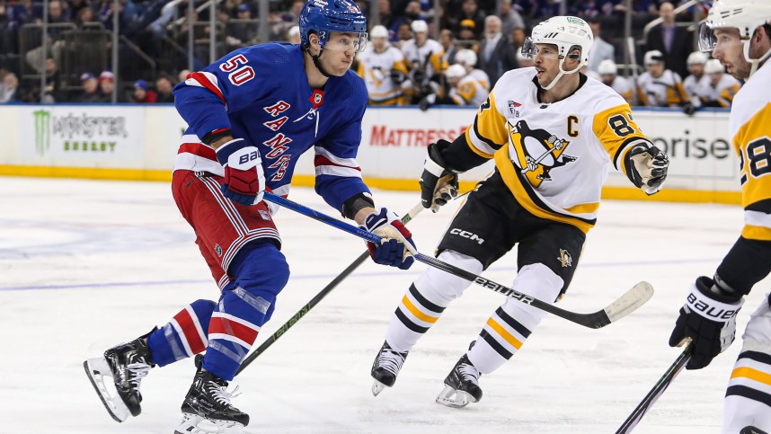 Apr 1, 2024; New York, New York, USA; New York Rangers left wing Will Cuylle (50) and Pittsburgh Penguins center Sidney Crosby (87) battle for position during the second period at Madison Square Garden. Mandatory Credit: Danny Wild-USA TODAY Sports