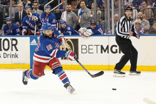 May 24, 2024; New York, New York, USA; New York Rangers center Vincent Trocheck (16) shoots the puck during the second period in game two of the Eastern Conference Final of the 2024 Stanley Cup Playoffs against the Florida Panthers at Madison Square Garden. Mandatory Credit: Vincent Carchietta-USA TODAY Sports