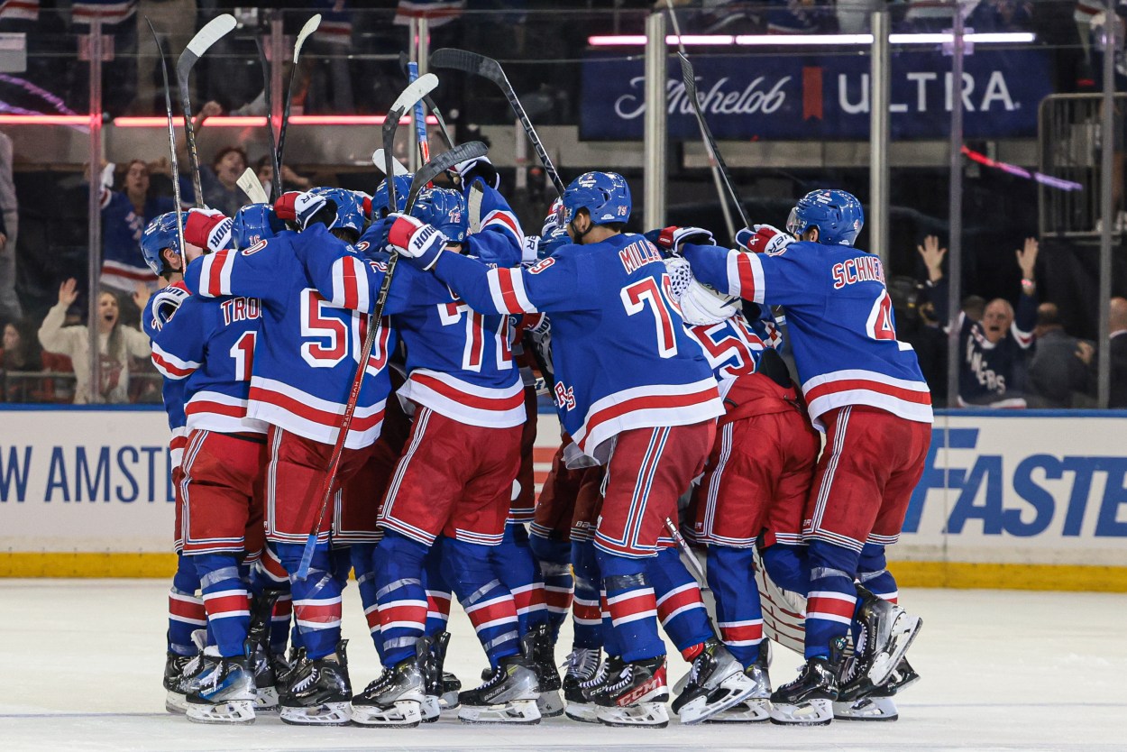 May 24, 2024; New York, New York, USA; New York Rangers center Barclay Goodrow (21) celebrates his game-winning overtime goal with teammates in game two of the Eastern Conference Final of the 2024 Stanley Cup Playoffs against the Florida Panthers at Madison Square Garden. Mandatory Credit: Vincent Carchietta-USA TODAY Sports