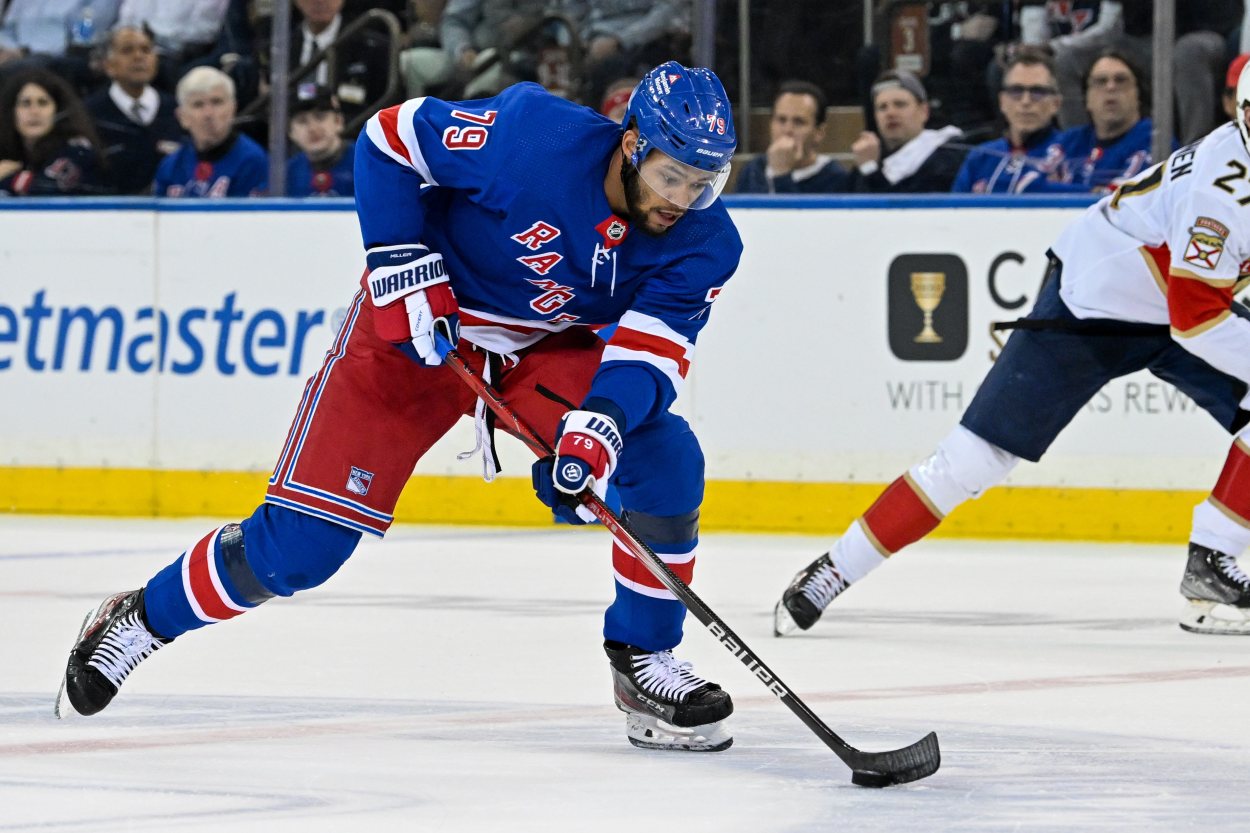 May 30, 2024; New York, New York, USA; New York Rangers defenseman K'Andre Miller (79) skates across center ice against the Florida Panthers during the first period in game five of the Eastern Conference Final of the 2024 Stanley Cup Playoffs at Madison Square Garden. Mandatory Credit: Dennis Schneidler-USA TODAY Sports