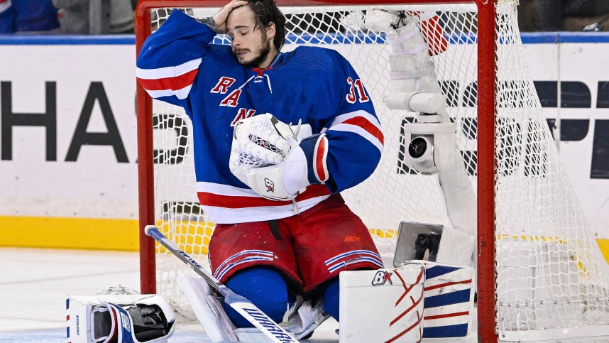 May 30, 2024; New York, New York, USA; New York Rangers goaltender Igor Shesterkin (31) recovers after getting run into by Florida Panthers defenseman Niko Mikkola (not pictured) during the second period in game five of the Eastern Conference Final of the 2024 Stanley Cup Playoffs at Madison Square Garden. Mandatory Credit: Dennis Schneidler-USA TODAY Sports