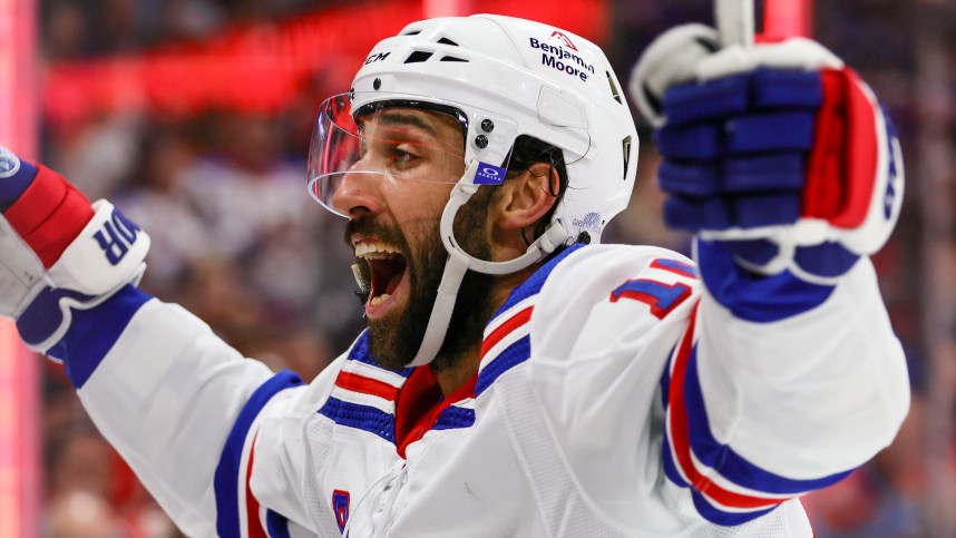 May 28, 2024; Sunrise, Florida, USA; New York Rangers center Vincent Trocheck (16) celebrates after a goal by left wing Alexis Lafreniere (not pictured) against the Florida Panthers during the third period in game four of the Eastern Conference Final of the 2024 Stanley Cup Playoffs at Amerant Bank Arena. Mandatory Credit: Sam Navarro-USA TODAY Sports