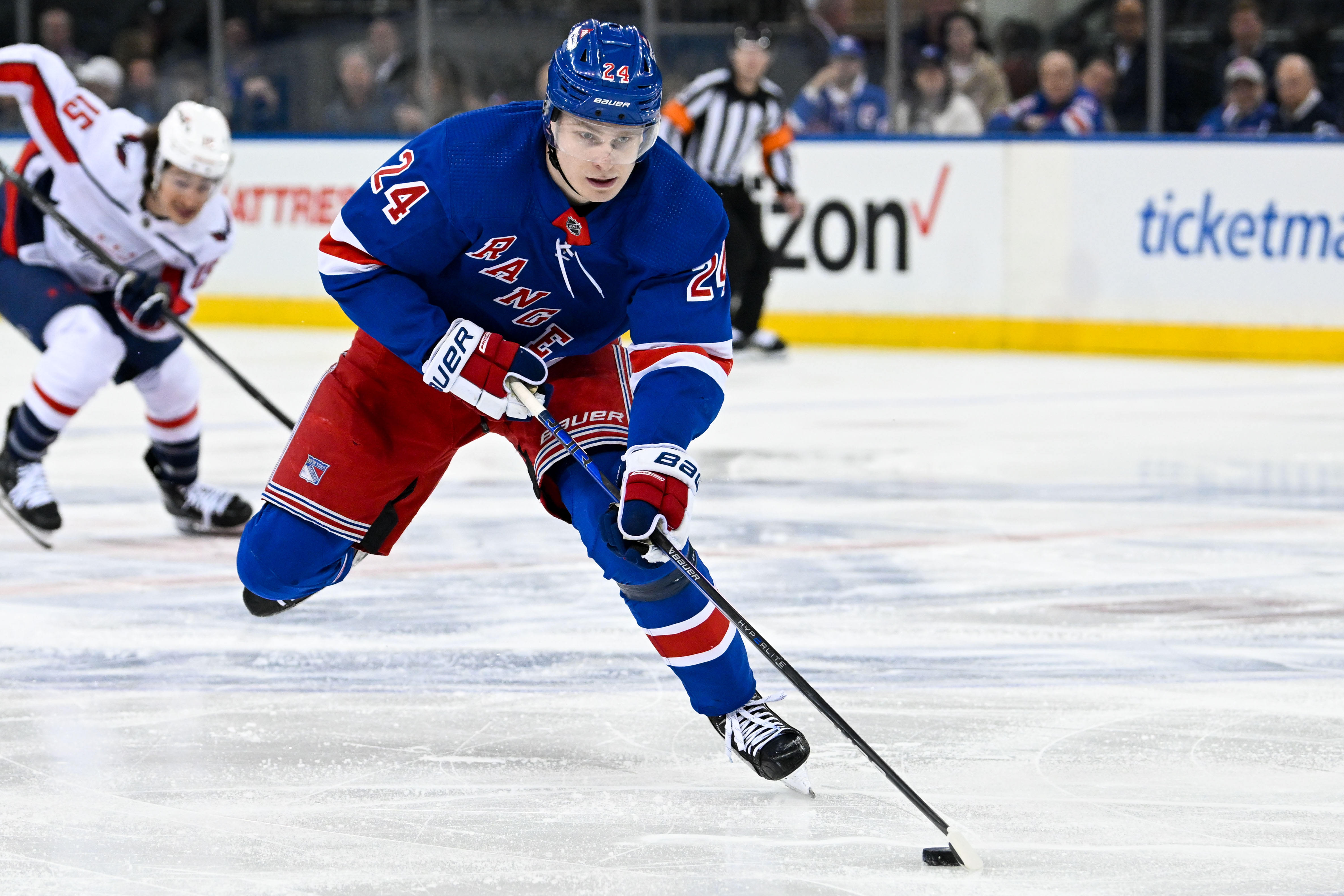 Apr 23, 2024; New York, New York, USA;  New York Rangers right wing Kaapo Kakko (24) skates across the blue line against the Washington Capitals during the third period in game two of the first round of the 2024 Stanley Cup Playoffs at Madison Square Garden. Mandatory Credit: Dennis Schneidler-USA TODAY Sports