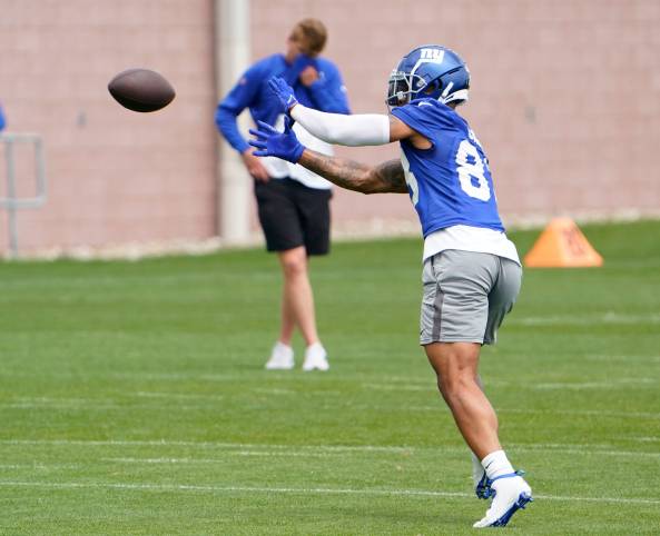 New York Giants tight end Lawrence Cager (83) catches the ball on day two of mandatory minicamp at the Giants training center on Wednesday, June 14, 2023, in East Rutherford.
