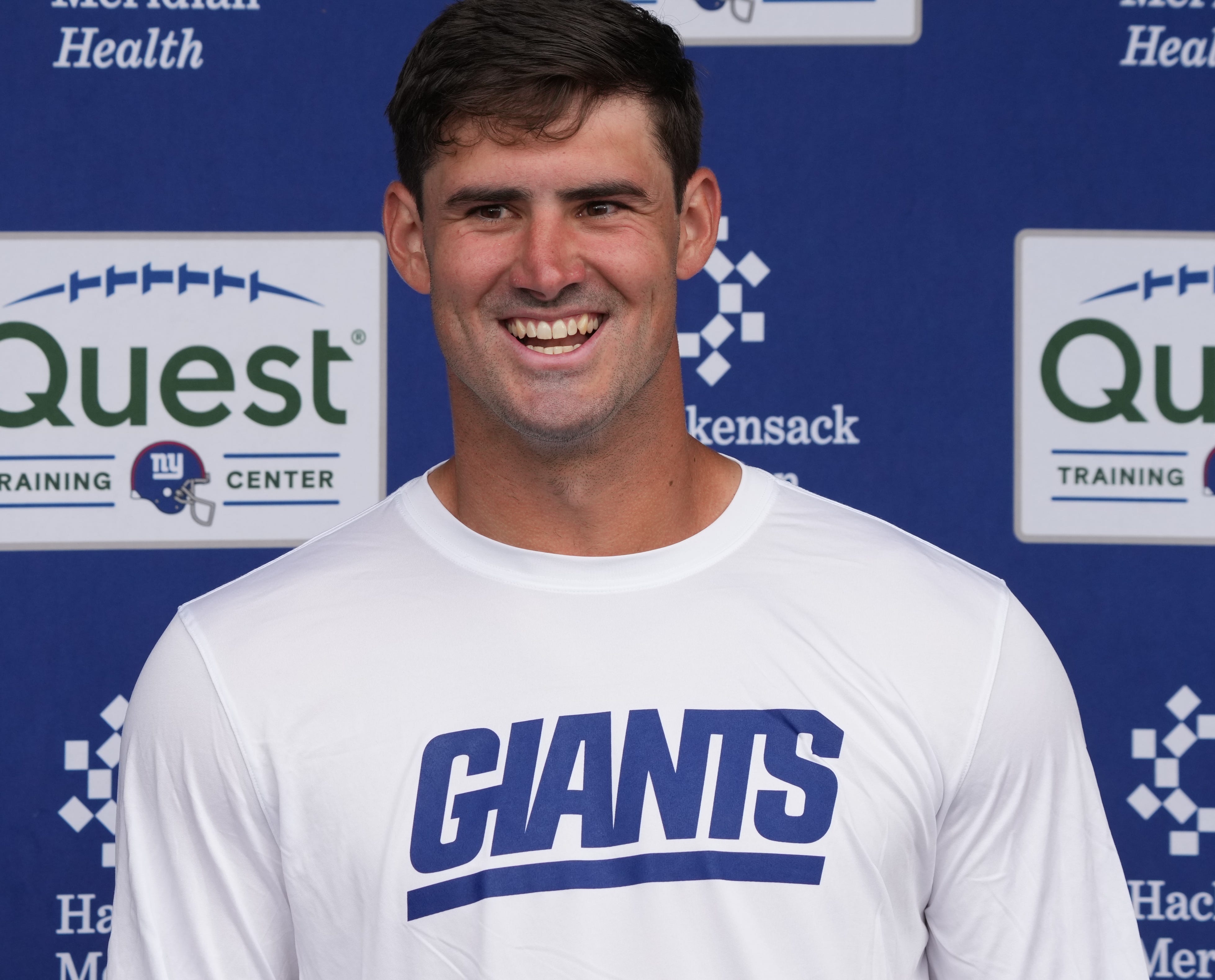 East Rutherford, NJ -- June 11, 2024 -- Quarterback, Daniel Jones is interviewed at the end of practice field at the NY Giants Mandatory Minicamp at their practice facility in East Rutherford, NJ.