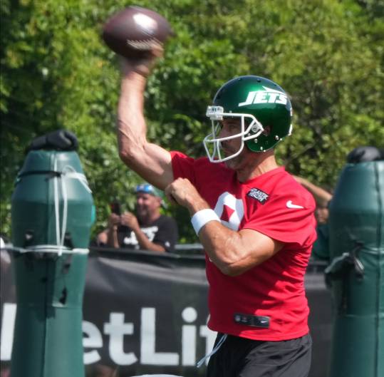 Florham Park, NJ -- July 27, 2024 -- Quarterback, Aaron Rodgers during the New York Jets training camp this morning.