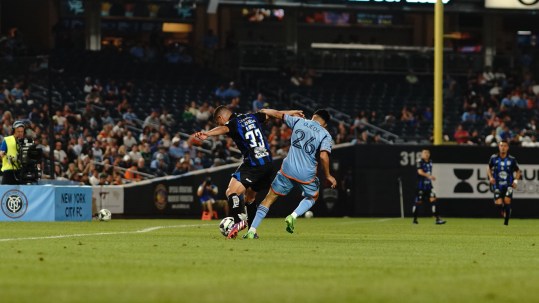 Agustin Ojeda fights for the ball | Credit: Melinda Morales 
