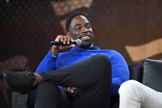 NEW YORK, NEW YORK (GIANTS) - AUGUST 16: Justin Tuck speaks onstage at the Fanatics Fest NYC 2024 at Jacob Javits Center on August 16, 2024 in New York City.  (Photo by Roy Rochlin/Getty Images for Fanatics)