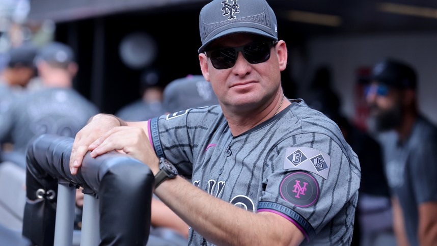 Jul 27, 2024; New York City, New York, USA; New York Mets manager Carlos Mendoza (64) in the dugout before a game against the Atlanta Braves at Citi Field. Mandatory Credit: Brad Penner-USA TODAY Sports