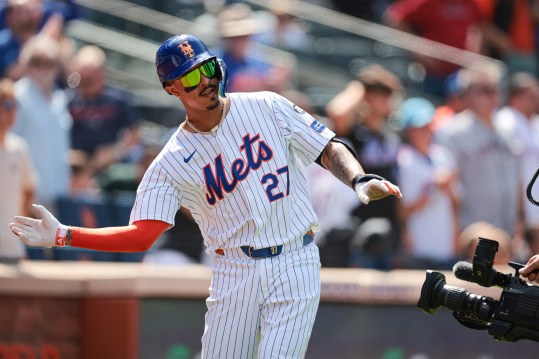 Aug 21, 2024; New York City, New York, USA; New York Mets third baseman Mark Vientos (27) reacts after hitting a solo home run during the seventh inning against the Baltimore Orioles at Citi Field. Mandatory Credit: Vincent Carchietta-USA TODAY Sports