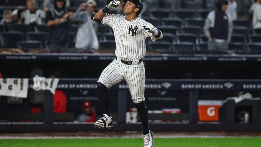 Aug 8, 2024; Bronx, New York, USA;  New York Yankees shortstop Oswaldo Cabrera (95) celebrates after hitting a solo home run in the ninth inning against the Los Angeles Angels at Yankee Stadium. Mandatory Credit: Wendell Cruz-USA TODAY Sports