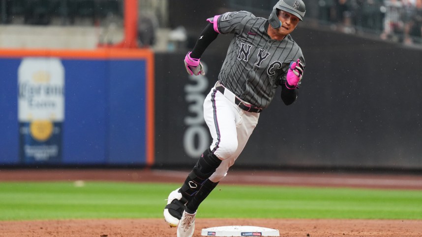 Aug 17, 2024; New York City, New York, USA; New York Mets left fielder Brandon Nimmo (9) rounds second base during the game against the Miami Marlins at Citi Field. Mandatory Credit: Lucas Boland-USA TODAY Sports