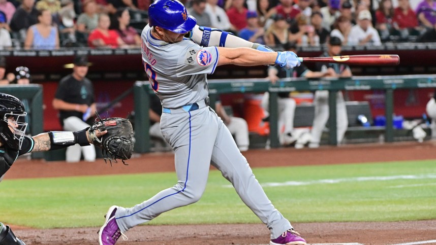 Aug 29, 2024; Phoenix, Arizona, USA;  New York Mets first base Pete Alonso (20) hits a solo home run in the second inning against the Arizona Diamondbacks at Chase Field. Mandatory Credit: Matt Kartozian-USA TODAY Sports