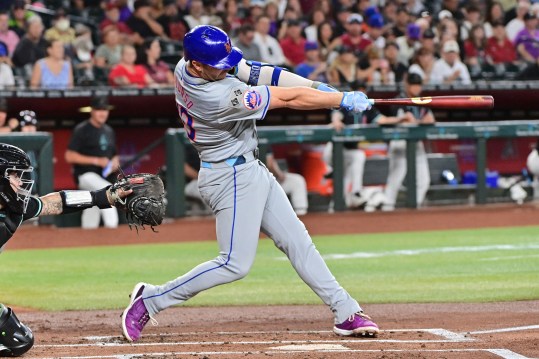 Aug 29, 2024; Phoenix, Arizona, USA;  New York Mets first base Pete Alonso (20) hits a solo home run in the second inning against the Arizona Diamondbacks at Chase Field. Mandatory Credit: Matt Kartozian-USA TODAY Sports