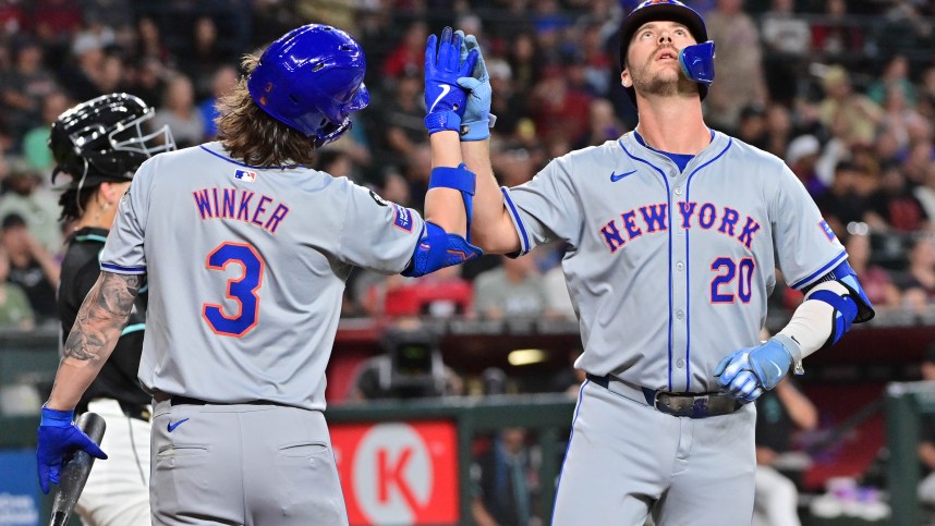 Aug 29, 2024; Phoenix, Arizona, USA;  New York Mets first base Pete Alonso (20) celebrates with outfielder Jesse Winker (3) after hitting a solo home run in the second inning against the Arizona Diamondbacks at Chase Field. Mandatory Credit: Matt Kartozian-USA TODAY Sports