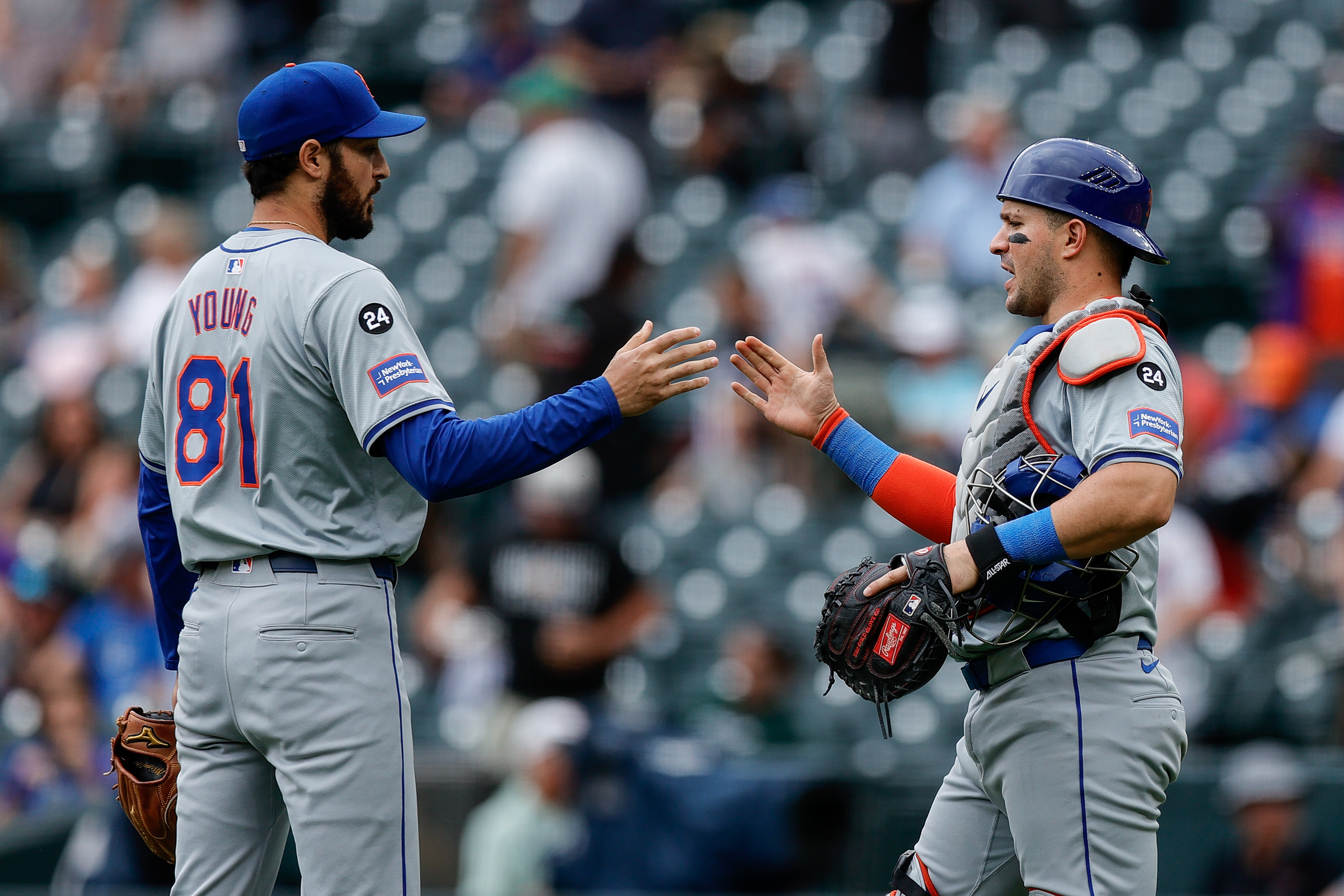 Aug 8, 2024; Denver, Colorado, USA; New York Mets relief pitcher Danny Young (81) celebrates with catcher Luis Torrens (13) after the game against the Colorado Rockies at Coors Field. Mandatory Credit: Isaiah J. Downing-USA TODAY Sports