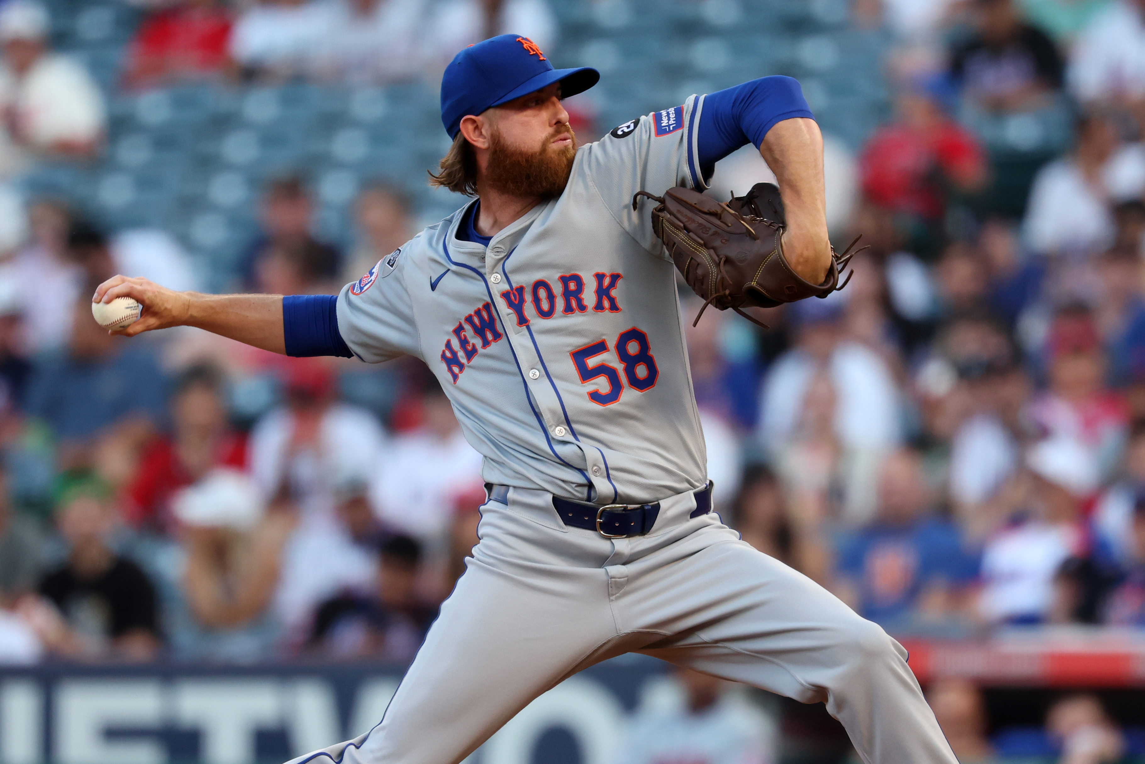 Aug 2, 2024; Anaheim, California, USA;  New York Mets starting pitcher Paul Blackburn (58) pitches during the first inning against the Los Angeles Angels at Angel Stadium. Mandatory Credit: Kiyoshi Mio-USA TODAY Sports