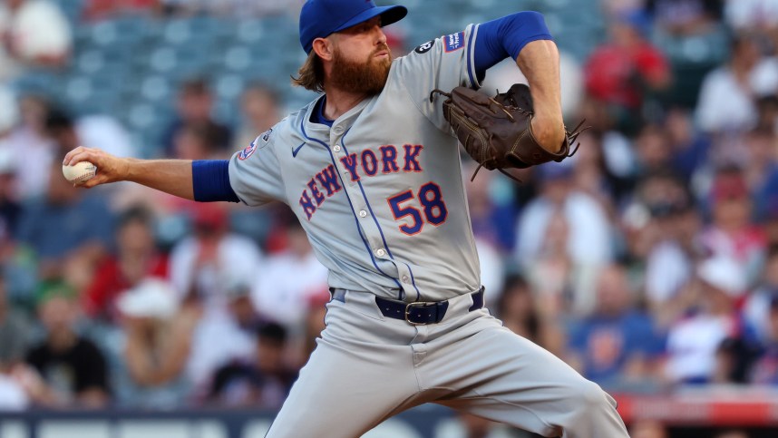 Aug 2, 2024; Anaheim, California, USA;  New York Mets starting pitcher Paul Blackburn (58) pitches during the first inning against the Los Angeles Angels at Angel Stadium. Mandatory Credit: Kiyoshi Mio-USA TODAY Sports