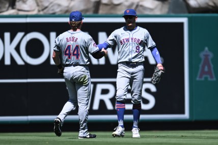 Aug 4, 2024; Anaheim, California, USA; during the New York Mets outfielder Harrison Bader (44) celebrates with outfielder Brandon Nimmo (9) after making a catch during the fifth inning at Angel Stadium. Mandatory Credit: Jonathan Hui-USA TODAY Sports