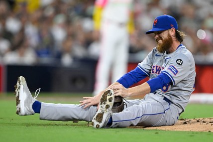 Aug 23, 2024; San Diego, California, USA; New York Mets starting pitcher Paul Blackburn (58) reacts after being hit during the third inning against the San Diego Padres at Petco Park. Mandatory Credit: Denis Poroy-USA TODAY Sports