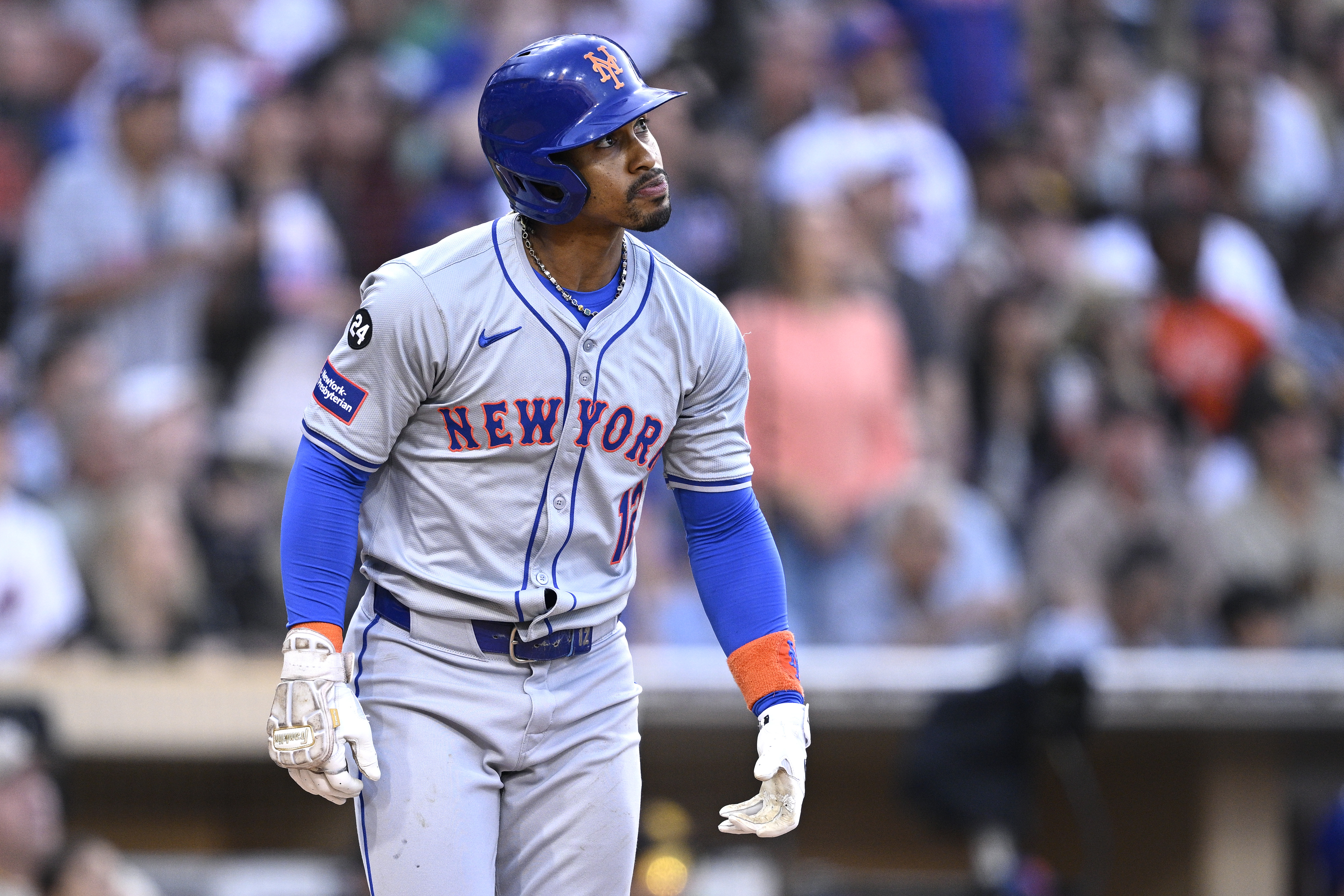 Aug 24, 2024; San Diego, California, USA; New York Mets shortstop Francisco Lindor (12) hits a grand slam home run against the San Diego Padres during the fourth inning at Petco Park. Mandatory Credit: Orlando Ramirez-USA TODAY Sports