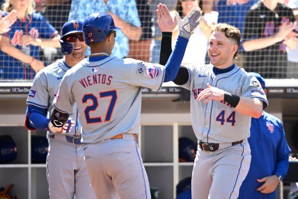 Aug 25, 2024; San Diego, California, USA; New York Mets third baseman Mark Vientos (27) is congratulated by center fielder Harrison Bader (44) after hitting a home run against the San Diego Padres during the seventh inning at Petco Park. Mandatory Credit: Orlando Ramirez-USA TODAY Sports