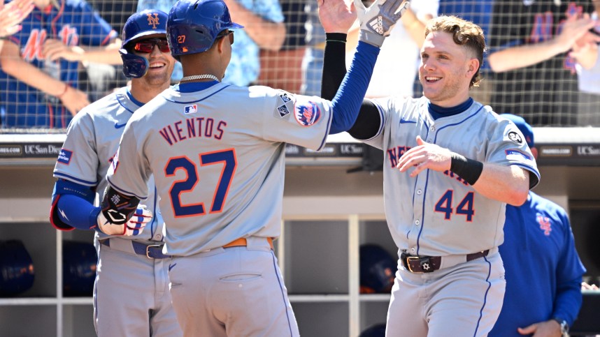 Aug 25, 2024; San Diego, California, USA; New York Mets third baseman Mark Vientos (27) is congratulated by center fielder Harrison Bader (44) after hitting a home run against the San Diego Padres during the seventh inning at Petco Park. Mandatory Credit: Orlando Ramirez-USA TODAY Sports