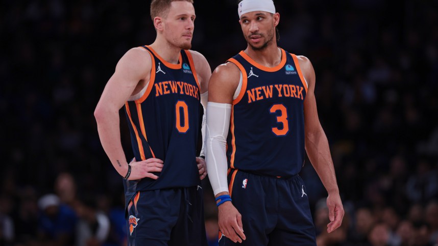 Apr 12, 2024; New York, New York, USA; New York Knicks guard Donte DiVincenzo (0) talks with guard Josh Hart (3) during the second half against the Brooklyn Nets at Madison Square Garden. Mandatory Credit: Vincent Carchietta-USA TODAY Sports