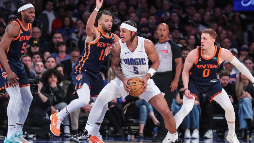 Mar 8, 2024; New York, New York, USA;  Orlando Magic forward Paolo Banchero (5) looks to drive past New York Knicks guard Jalen Brunson (11) in the fourth quarter at Madison Square Garden. Mandatory Credit: Wendell Cruz-USA TODAY Sports