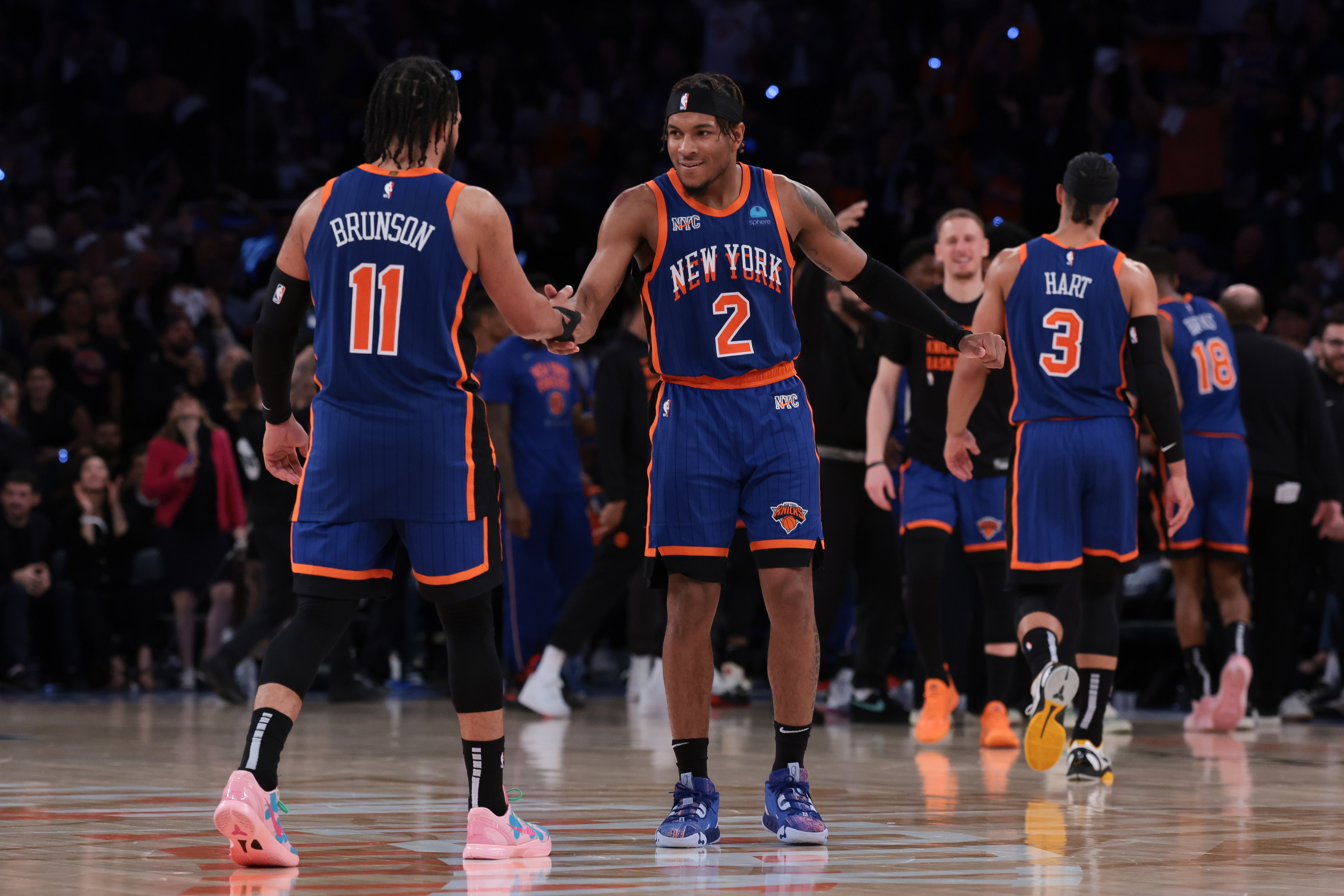 May 14, 2024; New York, New York, USA; New York Knicks guard Miles McBride (2) celebrates with guard Jalen Brunson (11) during the second half during game five of the second round for the 2024 NBA playoffs against the Indiana Pacers at Madison Square Garden. Mandatory Credit: Vincent Carchietta-USA TODAY Sports