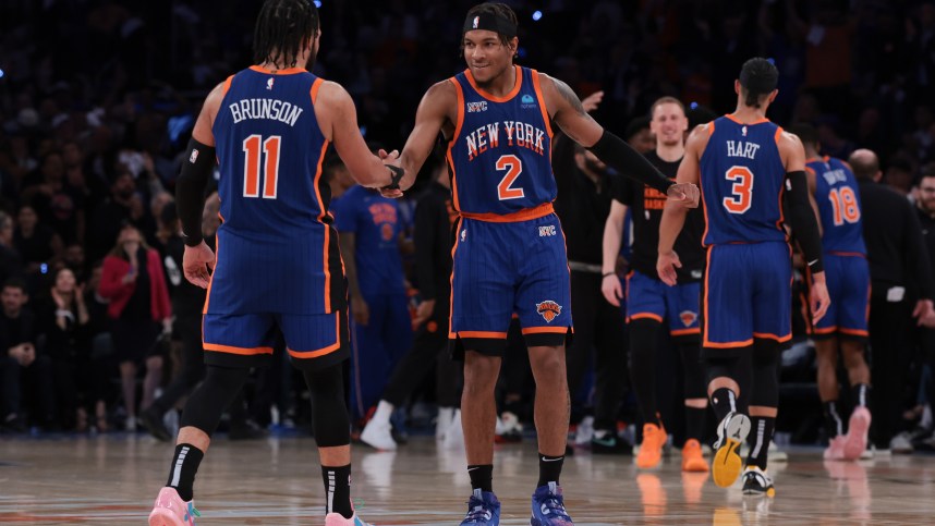 May 14, 2024; New York, New York, USA; New York Knicks guard Miles McBride (2) celebrates with guard Jalen Brunson (11) during the second half during game five of the second round for the 2024 NBA playoffs against the Indiana Pacers at Madison Square Garden. Mandatory Credit: Vincent Carchietta-USA TODAY Sports