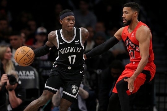 Apr 10, 2024; Brooklyn, New York, USA; Brooklyn Nets guard Dennis Schroder (17) handles the ball against Toronto Raptors forward Garrett Temple (17) during the third quarter at Barclays Center. Mandatory Credit: Brad Penner-USA TODAY Sports