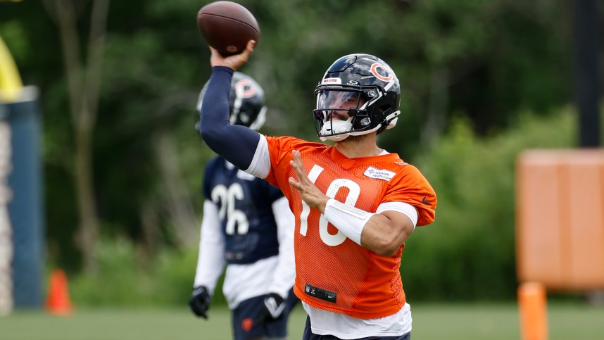 Jun 5, 2024; Lake Forest, IL, USA; Chicago Bears quarterback Caleb Williams (18) passes the ball during the team's minicamp at Halas Hall. Mandatory Credit: Kamil Krzaczynski-USA TODAY Sports, nfl