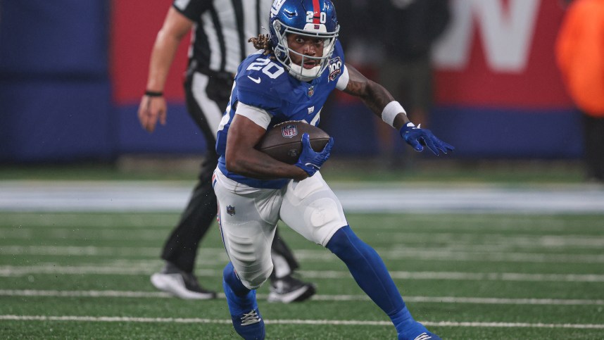 Aug 8, 2024; East Rutherford, New Jersey, USA; New York Giants running back Eric Gray (20) carries the ball during the first half against the Detroit Lions at MetLife Stadium. Mandatory Credit: Vincent Carchietta-USA TODAY Sports