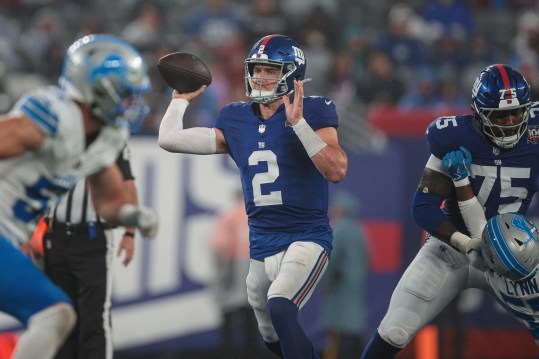 Aug 8, 2024; East Rutherford, New Jersey, USA; New York Giants quarterback Drew Lock (2) throws the ball while offensive tackle Joshua Ezeudu (75) blocks during the first half against the Detroit Lions at MetLife Stadium. Mandatory Credit: Vincent Carchietta-USA TODAY Sports