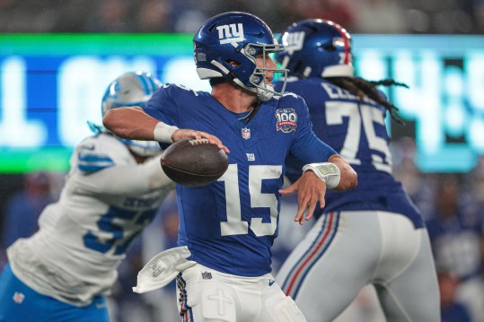 Aug 8, 2024; East Rutherford, New Jersey, USA; New York Giants quarterback Tommy DeVito (15) throws the ball while offensive tackle Joshua Ezeudu (75) blocks during the first half against the Detroit Lions at MetLife Stadium. Mandatory Credit: Vincent Carchietta-USA TODAY Sports