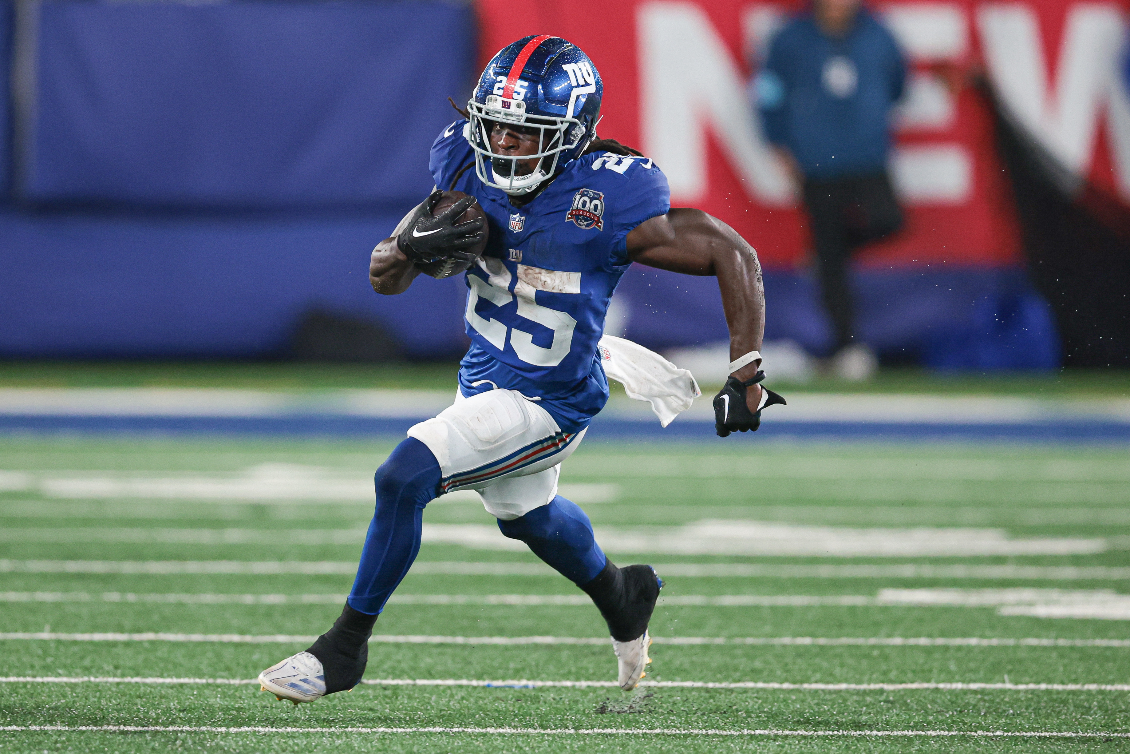 Aug 8, 2024; East Rutherford, New Jersey, USA; New York Giants running back Dante Miller (25) carries the ball during the second half against the Detroit Lions at MetLife Stadium. Mandatory Credit: Vincent Carchietta-USA TODAY Sports